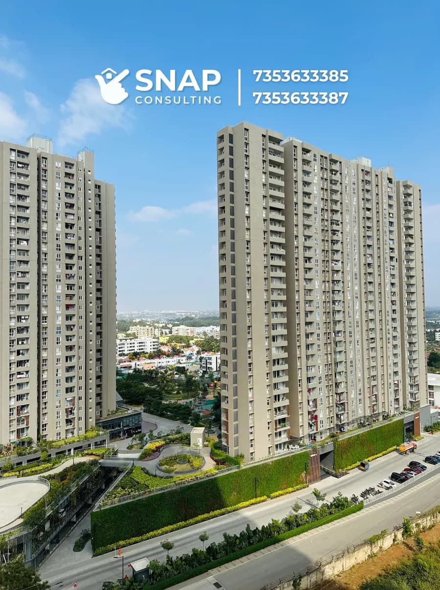 Assetz Marq residential towers above the landscaped podium and internal road