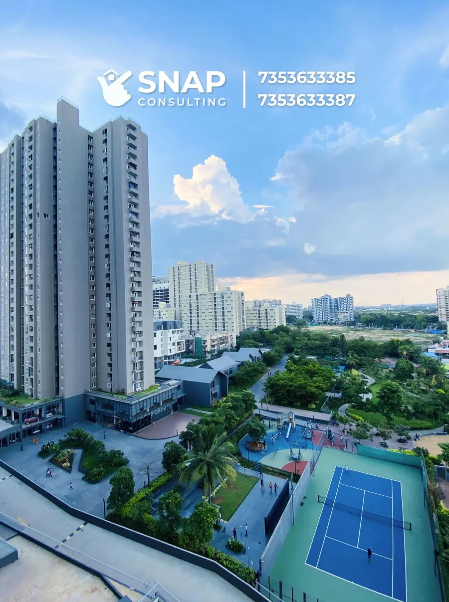 View from an Assetz Marq tower over the park, tennis court and pool deck