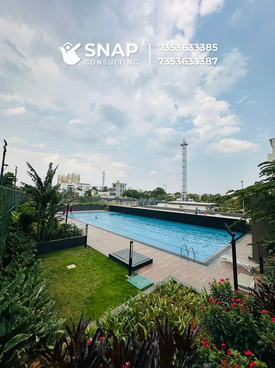 Swimming pool and landscaped deck at Assetz Marq