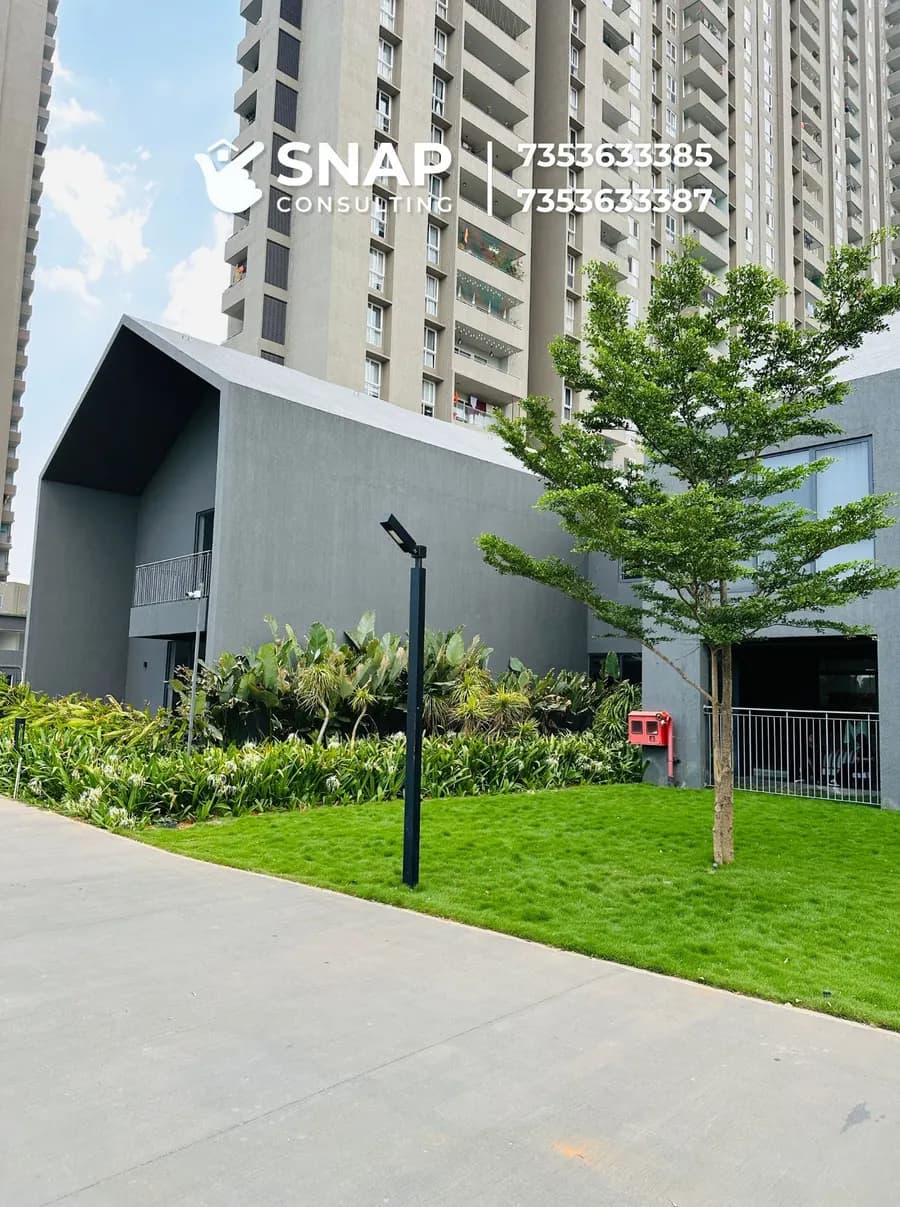 Clubhouse building and lawn at Assetz Marq