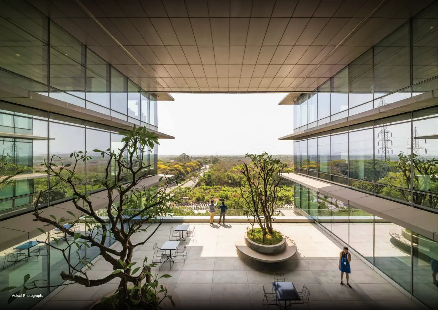 Artist's impression of a landscaped courtyard between buildings at Godrej Woodscapes