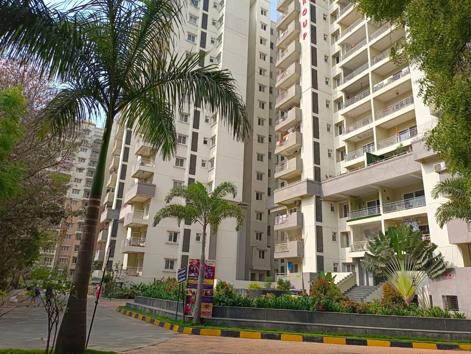 Mera Homes towers and landscaped entrance