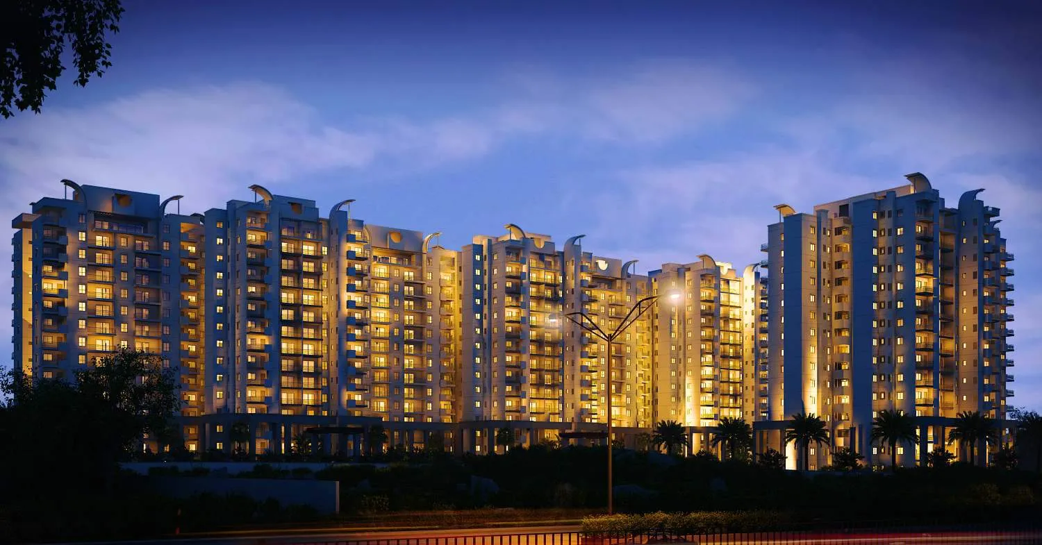 Mera Homes towers lit up at night